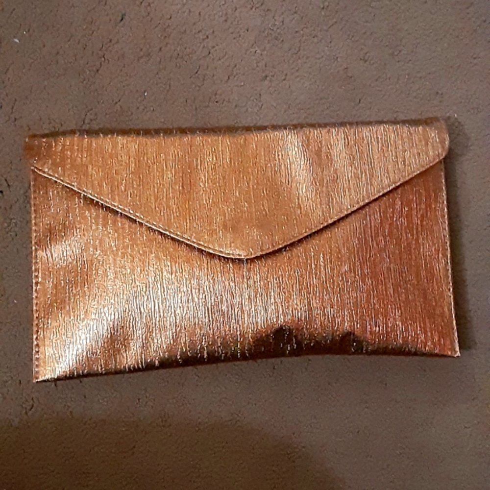 Medium sized metallic shimmery thin bronze clutch button flap